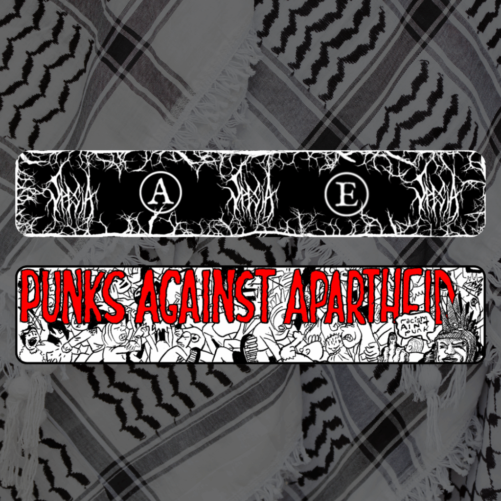 A long black and white banner with vines & thorns all around the edges and the stylised 'SPESIA' text throughout, with the circle (A) and (E) on the left and right of the banner.
Below, a long horizontal banner depicting a punk mosh pit, with large red squiggly letters depicting PUNKS AGAINST APARTHEID on top, and a punk giving the finger on the right saying ‘racism ain’t punk.’
